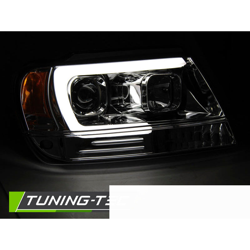 Fari Anteriori Tubolari Cromati per Jeep Grand Cherokee (99-05.05)