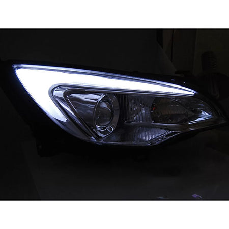 Fari Anteriori Cromati con Luci Diurne per Opel Astra J 2010-2015 Dx e Sx