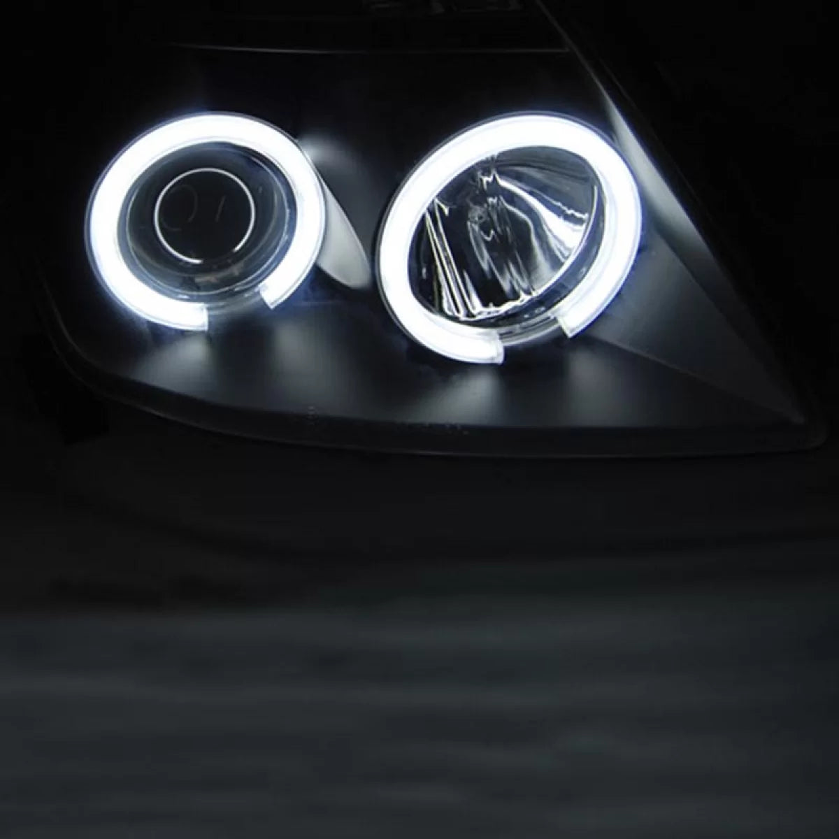 Fari Anteriori Neri CCFL Angel Eyes H1 per Suzuki Swift 05-10