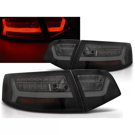 Fanali Posteriori LED Neri Fumé Sequenziali per Audi A6 08-11 Berlina