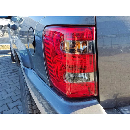 Fanali Posteriori LED Rossi Fumé Sinistro e Destro per Jeep Grand Cherokee