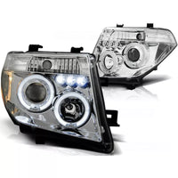Fari Angel Eyes LED cromati per Nissan Navara/Pathfinder 05-10