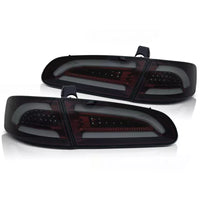 Luci posteriori full LED Lightbar per Seat Ibiza 6L 2002-2008 rosso/fumo