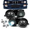 Fari neri con mirino + lente DE ottica Hella + lampadine H1 per BMW E30