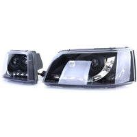 Faro proiettore + luce diurna a LED ottica nero per VW Transporter Bus T5 03-09