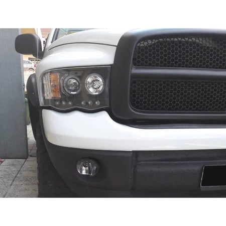 Fari Anteriori con Anelli Alogeni Sinistro e Destro per Dodge Ram 2002-2006