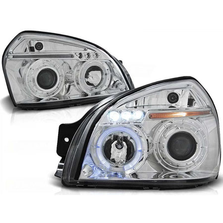 Fari Anteriori Tuning Cromati Sinistro e Destro per Hyundai Tucson 2004-2010